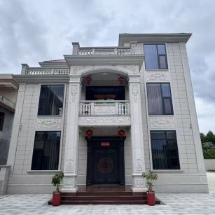 通辽 芝麻白石材别墅干挂案例展示